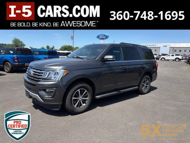 2019 Ford Expedition XLT in Gray — front three-quarter view