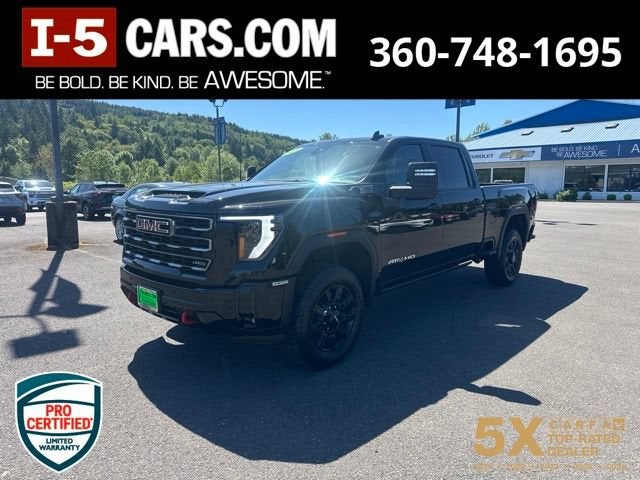 2025 GMC Sierra 2500 HD AT4 in Onyx Black — front three-quarter view