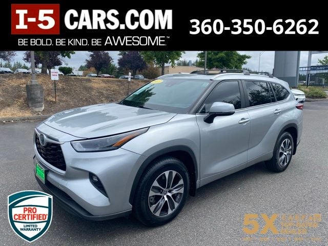 2023 Toyota Highlander Hybrid XLE in Celestial Silver Metallic — front three-quarter view