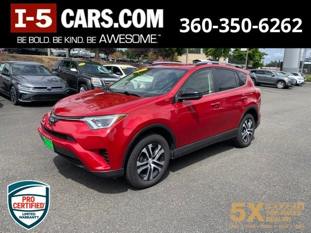 2017 Toyota RAV4 LE in Barcelona Red Metallic — front three-quarter view