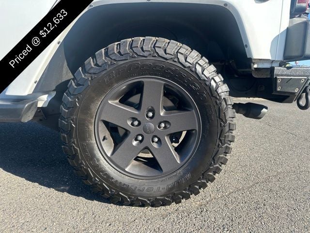 2016 Jeep Wrangler — rear three-quarter view