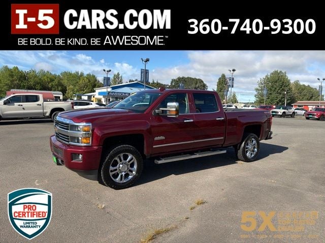 2015 Chevrolet Silverado 2500HD High Country in Deep Ruby Metallic — front three-quarter view