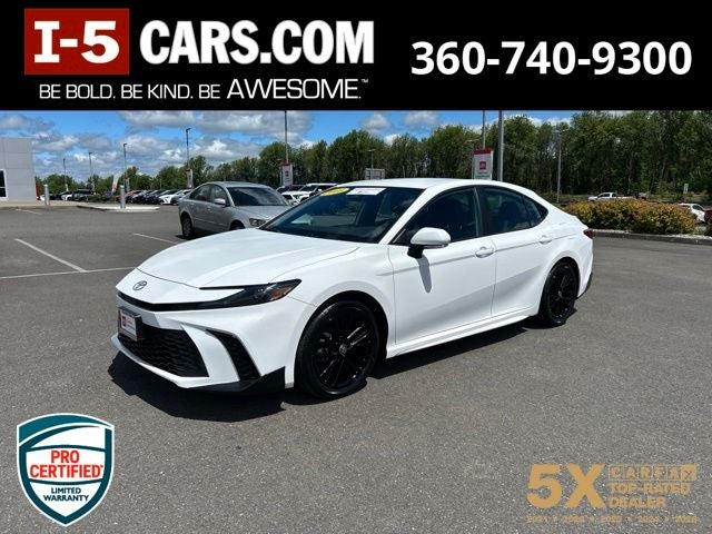 2025 Toyota Camry SE in Ice Cap — front three-quarter view