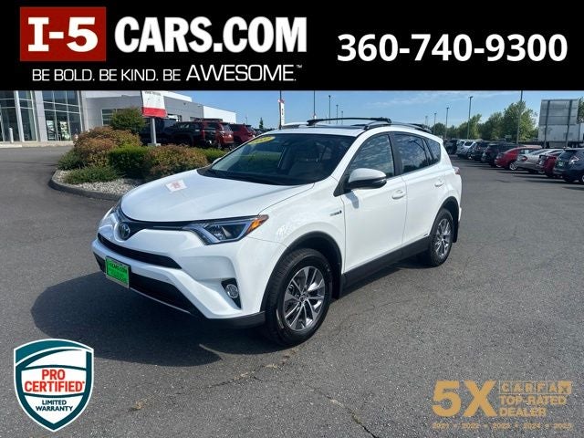 2017 Toyota RAV4 Hybrid XLE in Super White — front three-quarter view