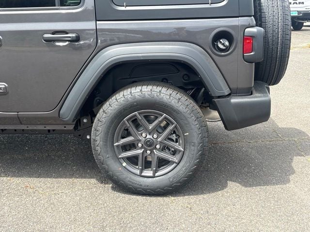 2026 Jeep Wrangler — rear three-quarter view