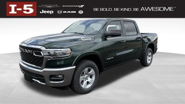 2026 RAM Ram 1500 RAM 1500 BIG HORN CREW CAB 4X4 5'7' BOX in Serrano-Green Metallic Exterior Paint — front three-quarter view