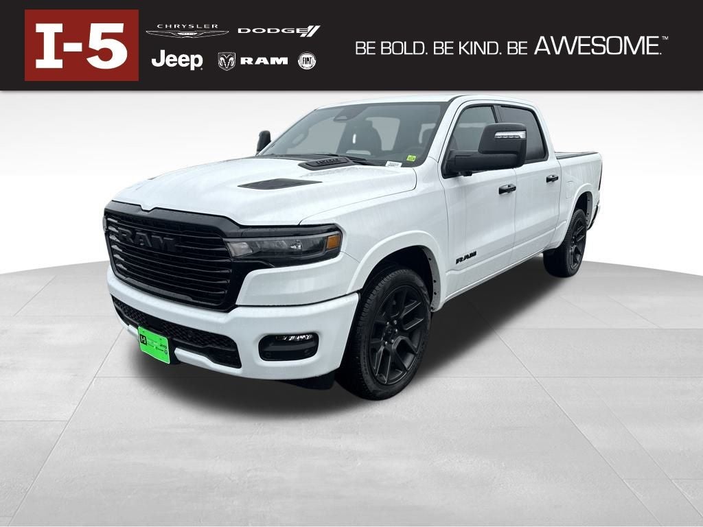 2026 RAM Ram 1500 RAM 1500 LARAMIE CREW CAB 4X4 5'7' BOX in Bright White Clear-Coat Exterior Paint — front three-quarter view