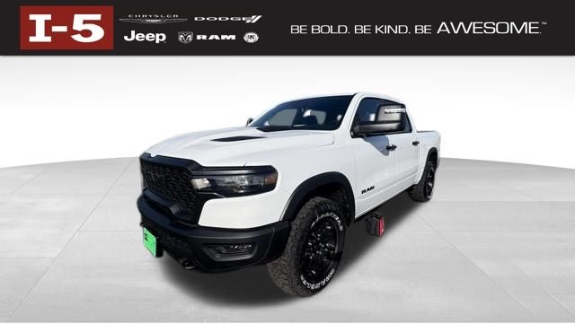 2026 RAM Ram 1500 RAM 1500 REBEL CREW CAB 4X4 5'7' BOX in Bright White Clear-Coat Exterior Paint — front three-quarter view
