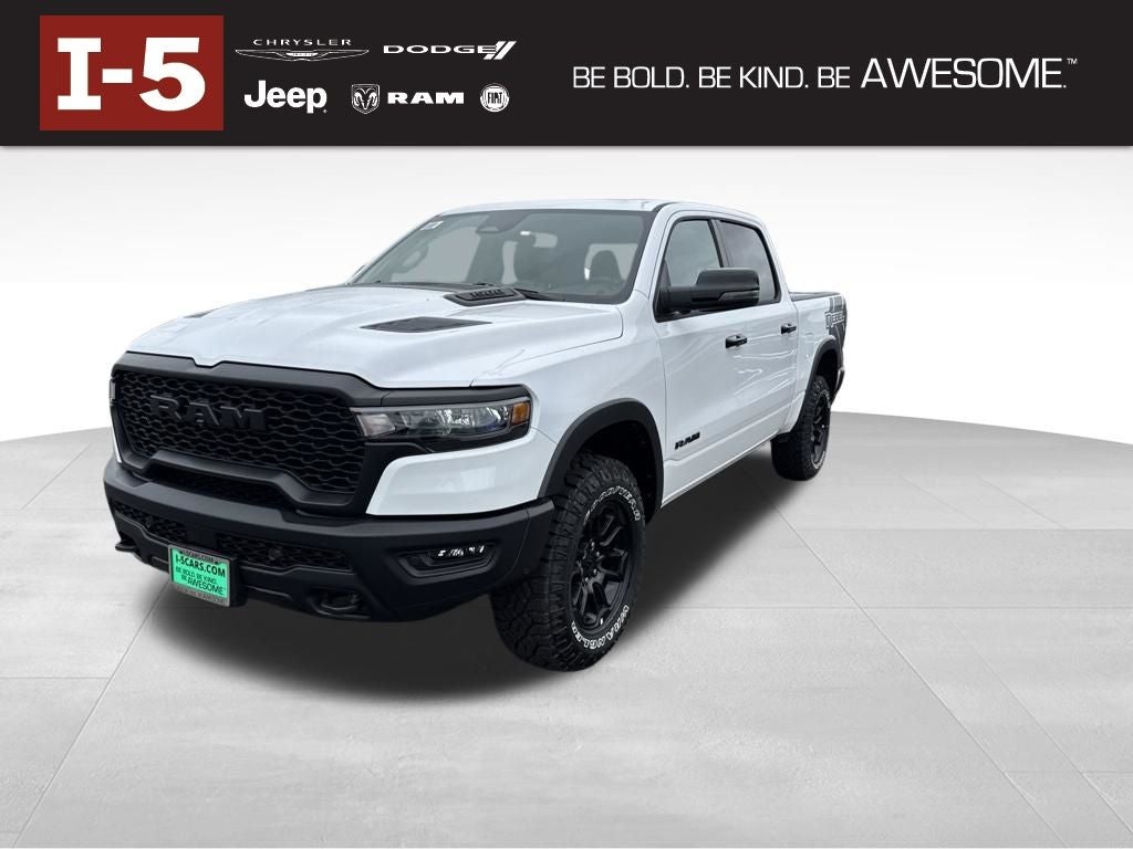 2026 RAM Ram 1500 RAM 1500 REBEL CREW CAB 4X4 5'7' BOX in Bright White Clear-Coat Exterior Paint — front three-quarter view