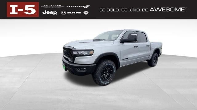 2026 RAM Ram 1500 RAM 1500 REBEL CREW CAB 4X4 5'7' BOX in Silver Zynith Exterior Paint — front three-quarter view