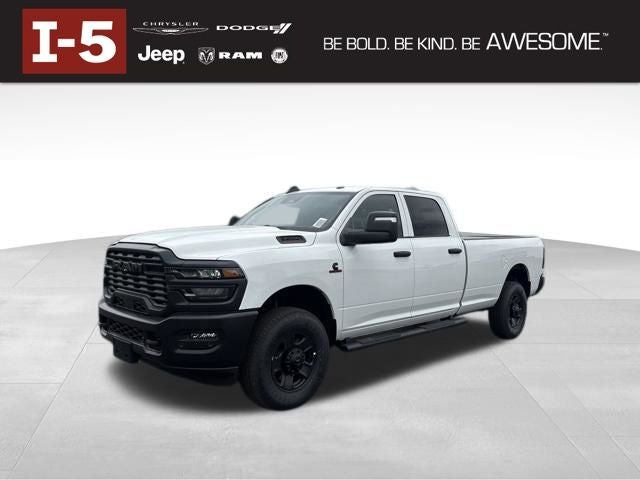 2026 RAM Ram 3500 RAM 3500 TRADESMAN CREW CAB 4X4 8' BOX in Bright White Clear-Coat Exterior Paint — front three-quarter view