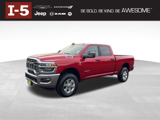 2026 RAM Ram 2500 RAM 2500 BIG HORN CREW CAB 4X4 6'4' BOX in Molten Red Pearl-Coat Exterior Paint — front three-quarter view