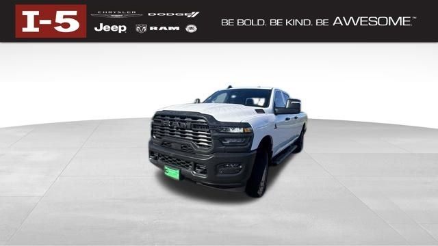 2026 RAM Ram 2500 RAM 2500 TRADESMAN CREW CAB 4X4 8' BOX in Bright White Clear-Coat Exterior Paint — front three-quarter view
