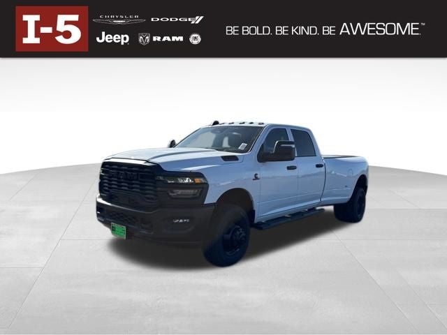 2026 RAM Ram 3500 RAM 3500 TRADESMAN CREW CAB 4X4 8' BOX in Bright White Clear-Coat Exterior Paint — front three-quarter view