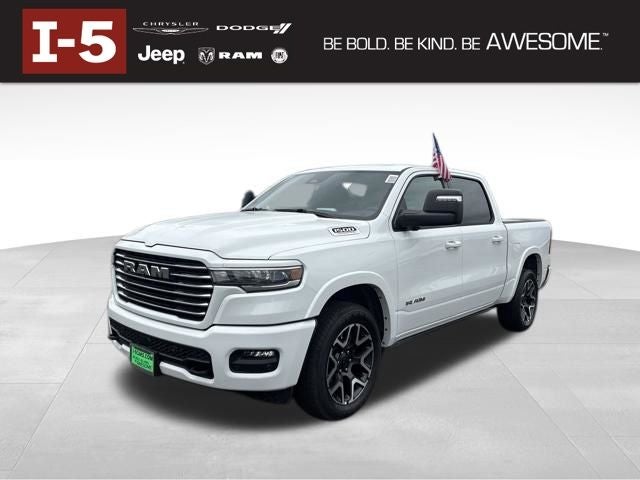 2026 RAM Ram 1500 RAM 1500 LARAMIE CREW CAB 4X4 5'7' BOX in Bright White Clear-Coat Exterior Paint — front three-quarter view
