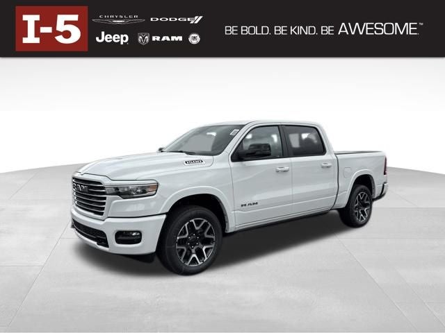 2026 RAM Ram 1500 RAM 1500 LARAMIE CREW CAB 4X4 5'7' BOX in Bright White Clear-Coat Exterior Paint — front three-quarter view