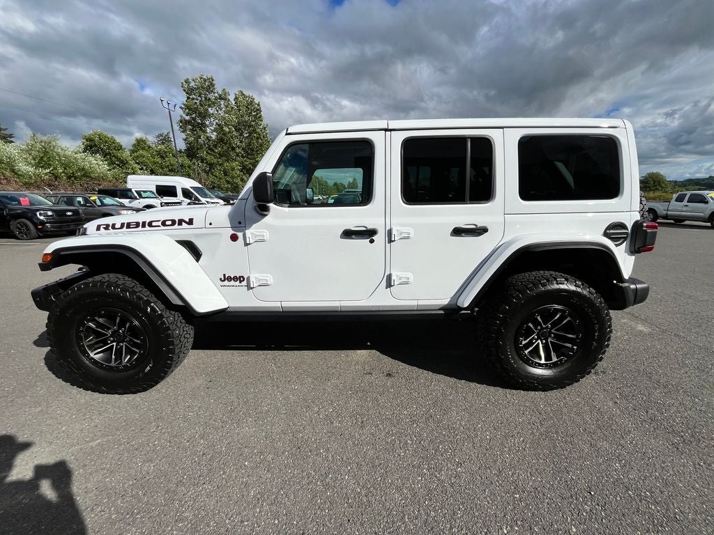 2024 Jeep Wrangler — rear three-quarter view